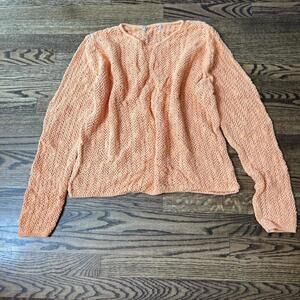 Peachy orange beachy knit sweater cover-up with a relaxed oversized fit